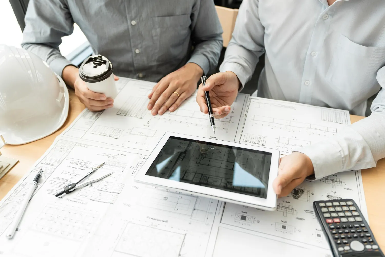 high angle view of people working on table